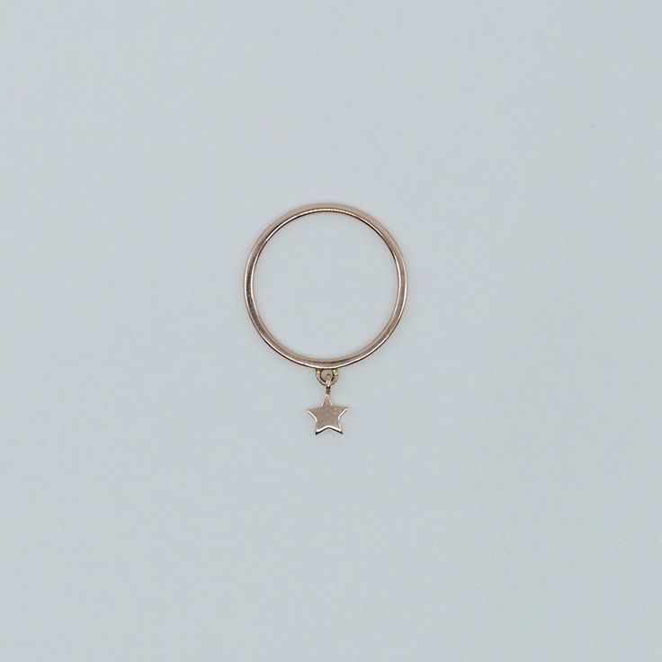 This Star Charm Ring is perfect for a best friend ring or even add it to your current stack for a little movement and swaying from the charm. A fun and sweet piece that's not too serious at all. Details: 14k band (yellow, rose or white) 14k Star measures 5mm Free Shipping on Domestic Orders Materials: 14k gold Need your ring bigger than whats offered? An additional fee will be applied to ring orders larger than size 8. Please contact us for exact pricing or feel free to place your order and we w Best Friend Ring, Best Friend Rings, Friend Rings, Hanging Stars, Charm Ring, A Best Friend, Charm Rings, Dangle Charms, Star Charms