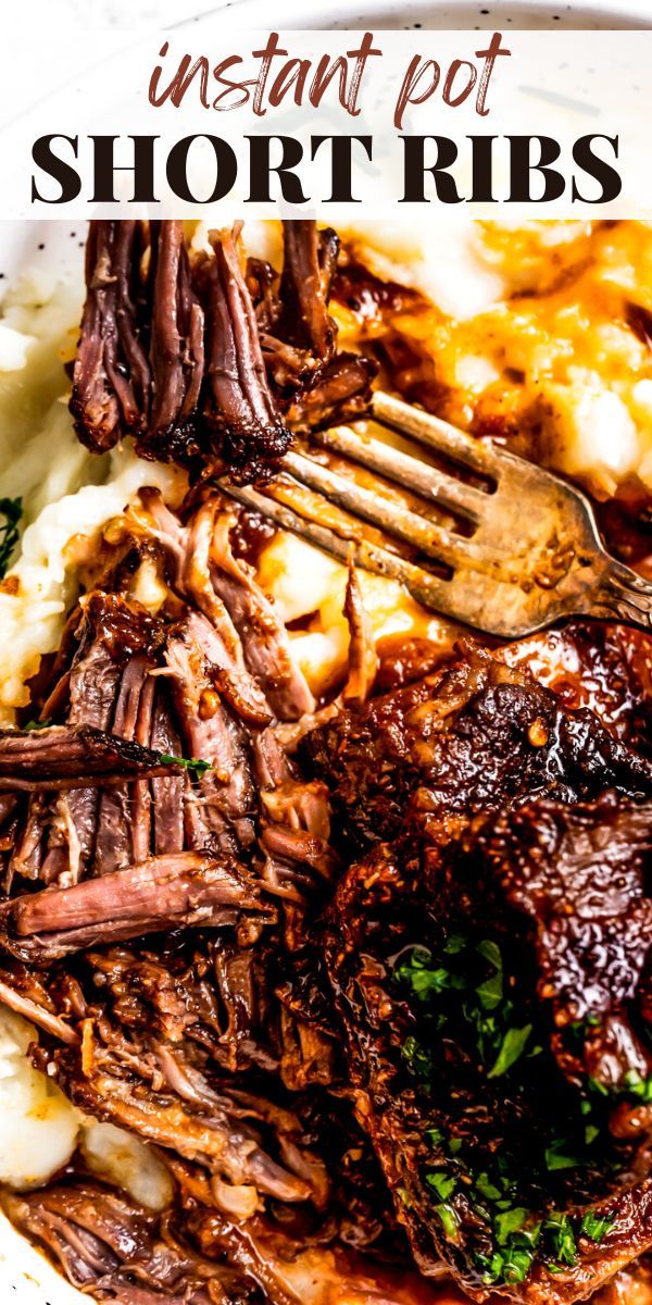 a white plate topped with short ribs and mashed potatoes