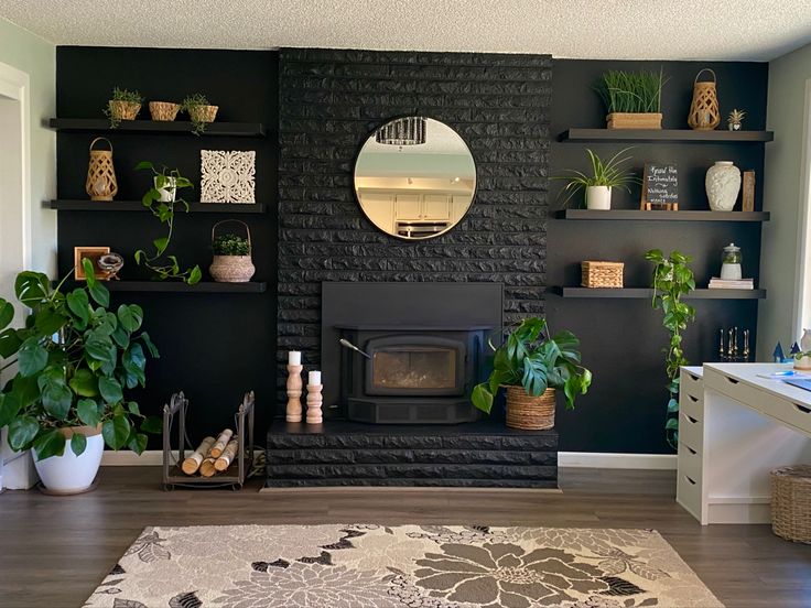 a living room filled with furniture and a fire place next to a wall mounted mirror