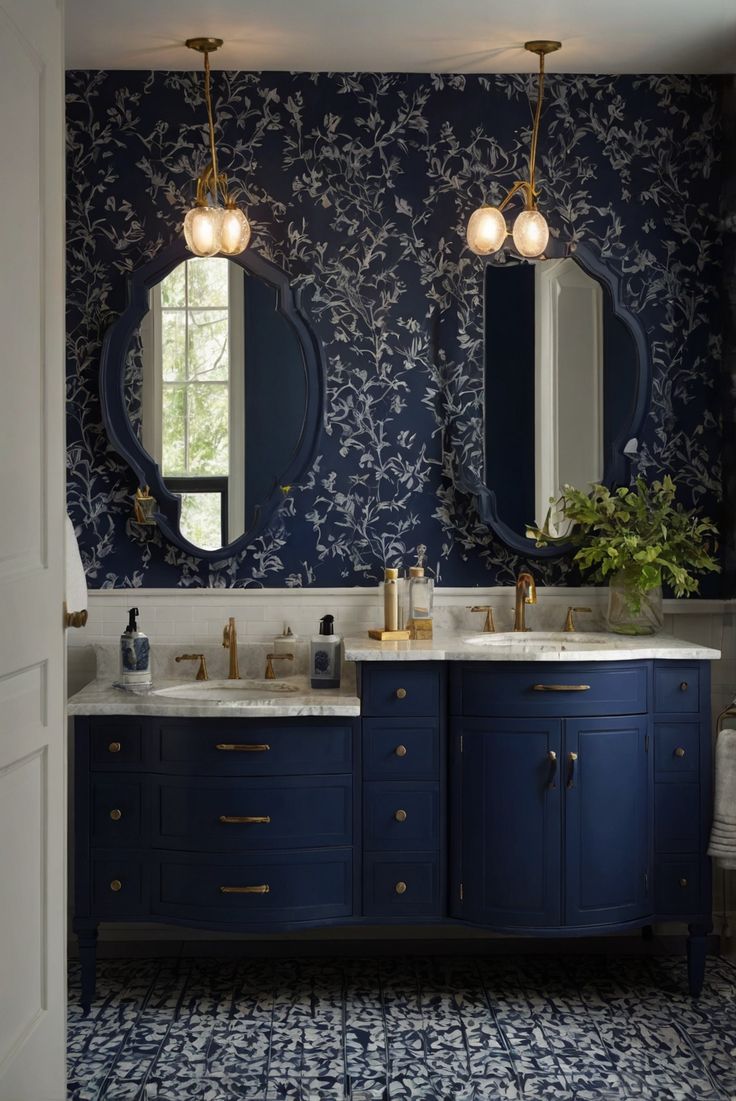 a bathroom with two sinks, mirrors and blue wallpaper on the walls in it