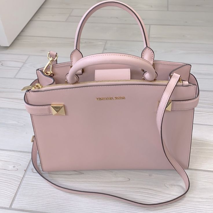 Never Worn. Faint Mark On Back Of Bag. Price Tag Attached. Color: Blossom. Elegant Michael Kors Satchel For Work, Michael Kors Blush Leather Shoulder Bag, Michael Kors Feminine Bags With Gold-tone Hardware, Feminine Michael Kors Bags With Gold-tone Hardware, Feminine Michael Kors Leather Bags, Pink Leather Shoulder Bag For Work, Feminine Leather Bags With Branded Hardware, Feminine Leather Satchel With Handles, Luxury Pink Bags For Workwear