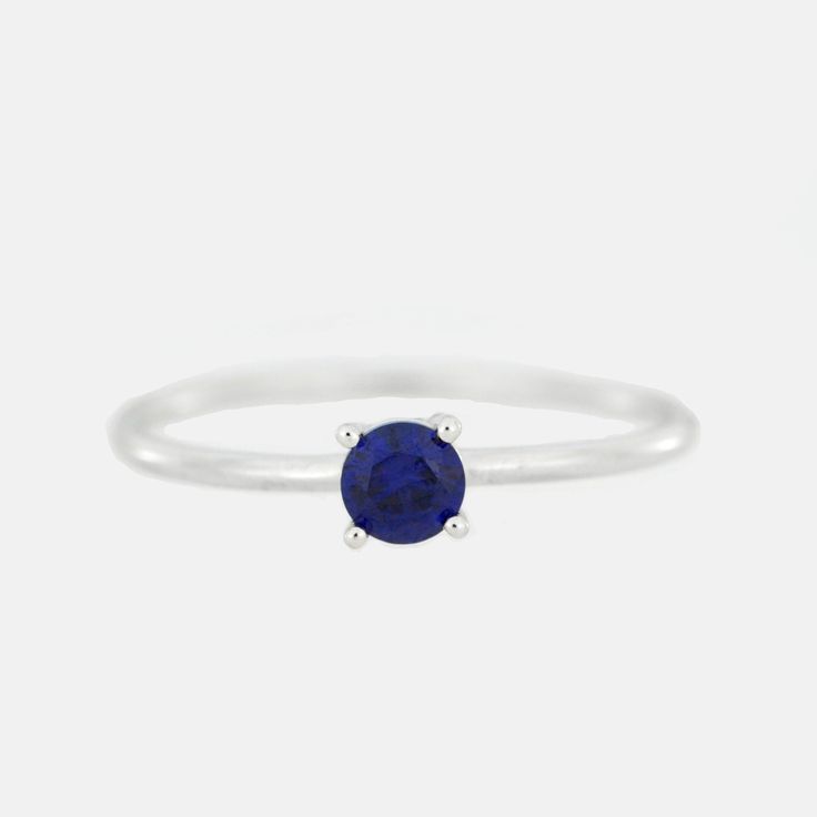 This is a beautiful Sapphire ring. It is set in real solid 14Kt Gold. You can choose if you want 14Kt White Gold, 14Kt Yellow Gold or 14Kt Rose Gold. This is the perfect gift for mom, wife, fiancee, girlfriend, valentine, daughter, family or friend. It is a special gift for mother's day, valentine's day, wedding, anniversary, birthday, Christmas, Easter, New Year's and any holiday. 4mm Created Blue Sapphire Metal Weight: 0.91 Grams 1.25mm ring width Comes in jewelry box MATCHING NECKLACE, EARRIN Classic Crystal Ring With Birthstone In Round Cut, Classic Crystal Birthstone Ring With Round Cut, Everyday White Gold Rings With Prong Setting, Classic Sapphire Birthstone Ring In Sterling Silver, Classic Birthstone Ring With Round Band, Classic Sterling Silver Birthstone Ring With Gemstone, Classic Round Band Birthstone Ring, Classic Round Crystal Birthstone Ring, Classic Everyday Sterling Silver Birthstone Ring