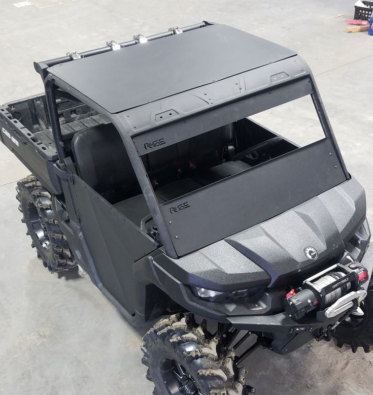 an off - road vehicle parked in a parking lot