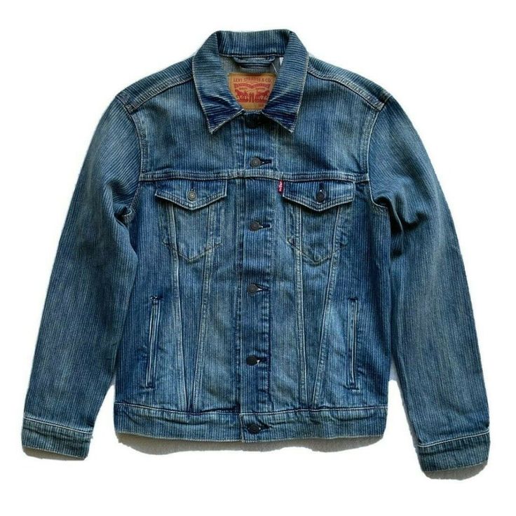 Levi's Men's Denim Trucker Jacket The Original Jean Jacket Since 1962. Features A Standard Fit With A Hem That Hits Below The Waist And Welt Hand Pockets. Regular Fit; Button Front Closure And Button Cuffs. Straight On The Body; Hits Below The Waist Two Side Welt Pockets; Two Flap Chest Pockets Cotton/Elastane Machine Washable Classic Washed Blue Denim Jacket With Pockets, Classic Denim Outerwear In Medium Wash, Classic Medium Wash Denim Outerwear, Classic Levi's Relaxed Fit Denim Jacket, Levi's Medium Wash Denim Jacket For Streetwear, Classic Denim Blue Vest With Pockets, Classic Blue Relaxed Fit Denim Jacket, Classic Blue Denim Jacket Relaxed Fit, Levi's Washed Denim Jacket