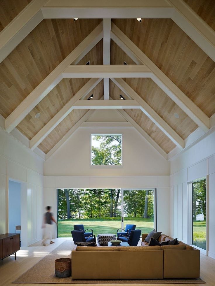 a large open living room with high ceilings