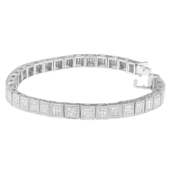 A modern geometric design gives this glamorous bracelet an undeniably bold look. Sprinkled with small, round diamonds inside chic cube links, this 14 karat white gold piece is nothing short of stunning.  (2.86 cttw, H-I Color, SI1-SI2 Clarity) Modern Diamond Bracelet With Pave Setting, Modern Sterling Silver Bracelet With Cubic Zirconia, Modern White Jubilee Tennis Bracelet, Modern Diamond Bracelet With Baguette Cut Accents, Modern Baguette Cut Diamond Bracelet With Accents, Modern White Diamond Cut Bracelet, Modern Baguette Cut Diamond Bracelet, Modern Diamond White Tennis Bracelet, Modern Diamond White Bracelets With Pave Setting