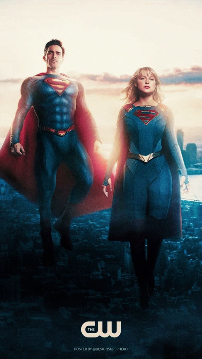 two people dressed as superman and supergirl standing next to each other in front of a cityscape