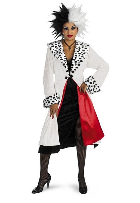 a woman in a white coat and black skirt holding a red bag while standing on a white background