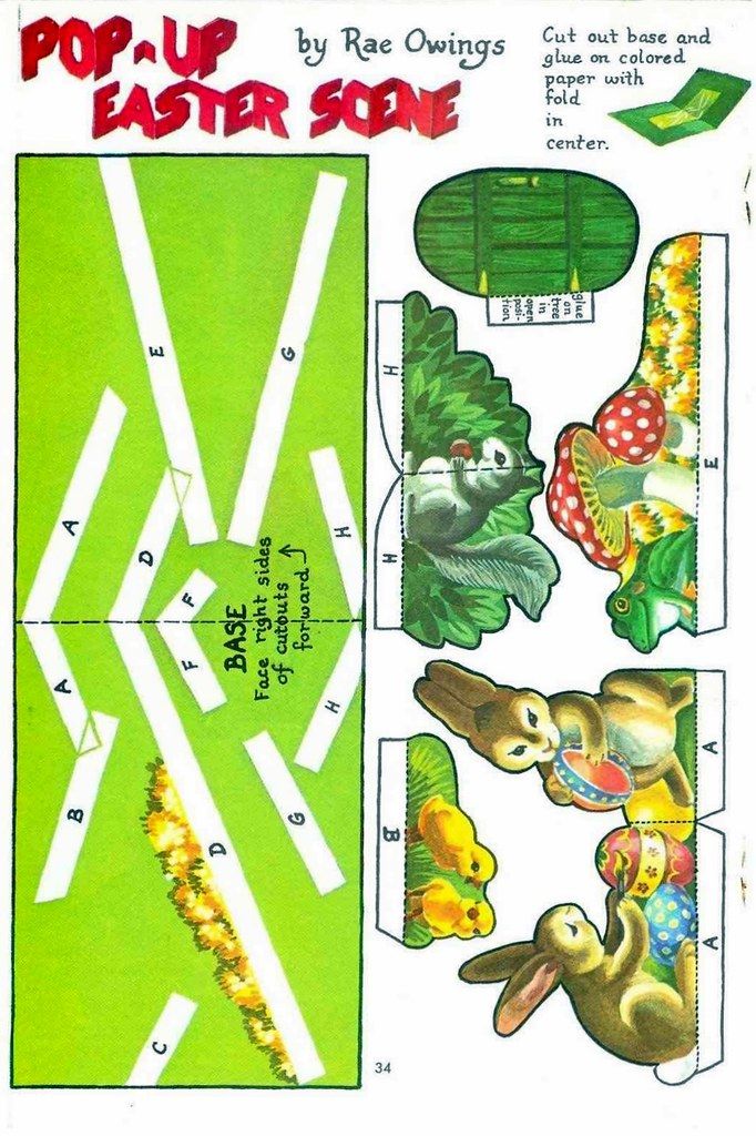 an old book with paper cut outs and pictures on the pages, showing different types of easter decorations