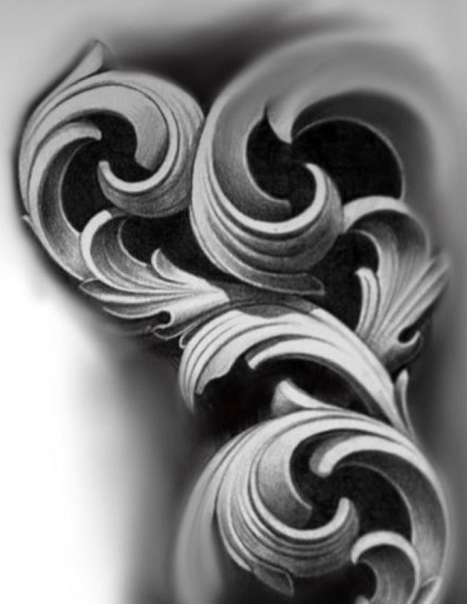 black and white photograph of an intricate design on the side of a woman's arm