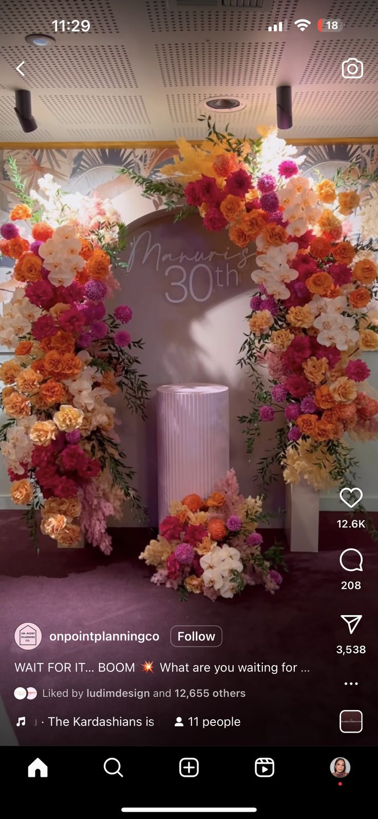 an arrangement of flowers is displayed on the phone screen, and it's time to start decorating