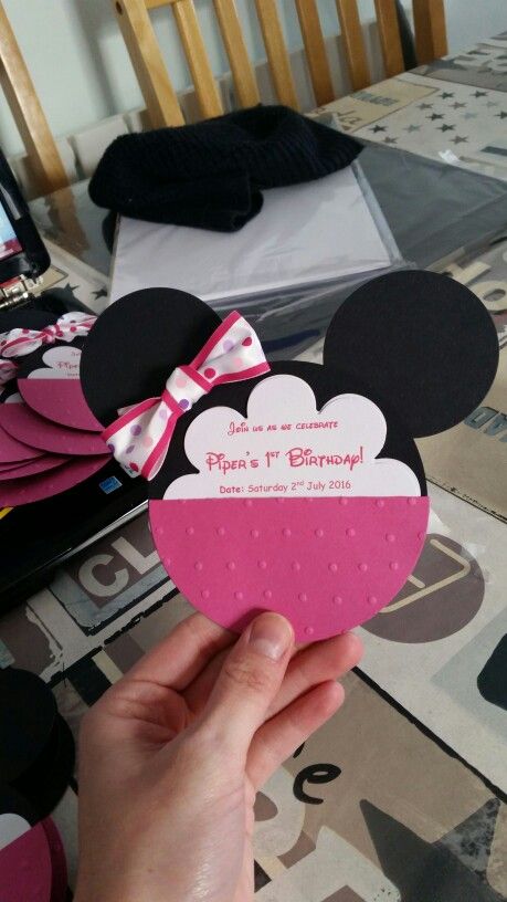 someone is holding up a minnie mouse birthday card