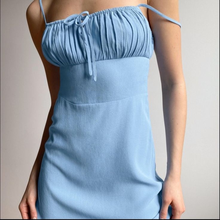 Condition: Nwt Color: Sky Blue This Is A Slim-Fit Mini Dress With A Soft-Gathered Bust And Tie Detail At The Neckline. It's Made From Drapey, Textured Fabric. Features Adjustable Strapsinvisible Zipper At Side Seamdarted At Back For Shaping Materials & Care Content: 100% Viscose; Lining: 100% Polyestercare: Machine Washimported Light Blue Fitted Maxi Dress With Spaghetti Straps, Light Blue Spaghetti Strap Dress With Tie Back, Blue Fitted Mini Dress With Tie Back, Fitted Blue Mini Dress With Tie Back, Blue Mini Dress With Tie Back And Spaghetti Straps, Blue Mini Dress With Spaghetti Straps And Tie Back, Blue Spaghetti Strap Dress With Tie Back, Light Blue Fitted Sundress, Fitted Light Blue Sundress