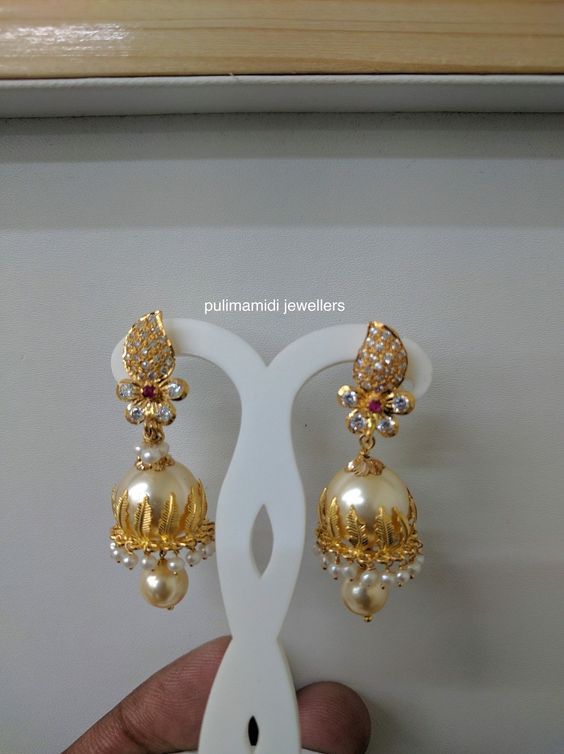 Sparkling Fashion: Gold Jhumka Earring designs latest 2019/ Gold buttalu Gold Buttalu, Gold Wedding Earrings, Gold Jhumka, Gold Jhumka Earrings, Gold Pearl Jewelry, Gold Earrings Models, Pearl Jewelry Design, Pearl Necklace Designs, Gold Necklace Indian Bridal Jewelry