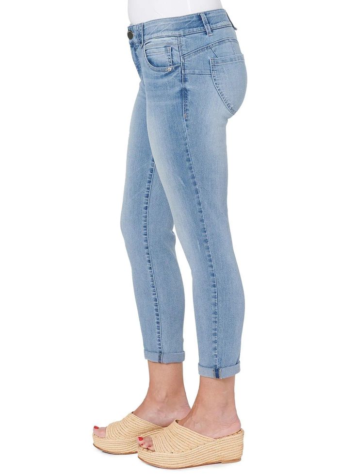 A staple you must always have in your wardrobe, the light wash "Ab"solution® Ankle Skimmer offers tummy control with slimming power-mesh panels, a no-gap waist, and the perfect "booty lift." Made from incredibly soft and comfy stretch denim in an artisanal wash with delicate whiskering and fading detail. These jeans ship with a rolled cuff that "skims" the ankle; customize your look by wearing them cuffed or uncuffed at the hem. The blend of cotton, lyocell, polyester, and spandex creates a soft Form Fitting Dress, Light Blue Denim, Washed Jeans, Snug Fit, Stretch Denim, Levi Jeans, Blue Denim, Light Blue, Relaxed Fit