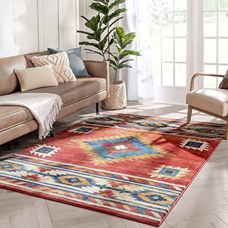 a living room filled with furniture and a rug