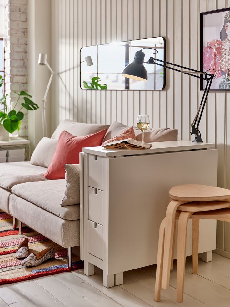 a living room filled with furniture and decor