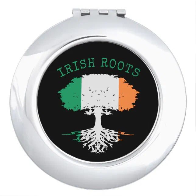 the irish roots compact pillbox has an image of a tree on it