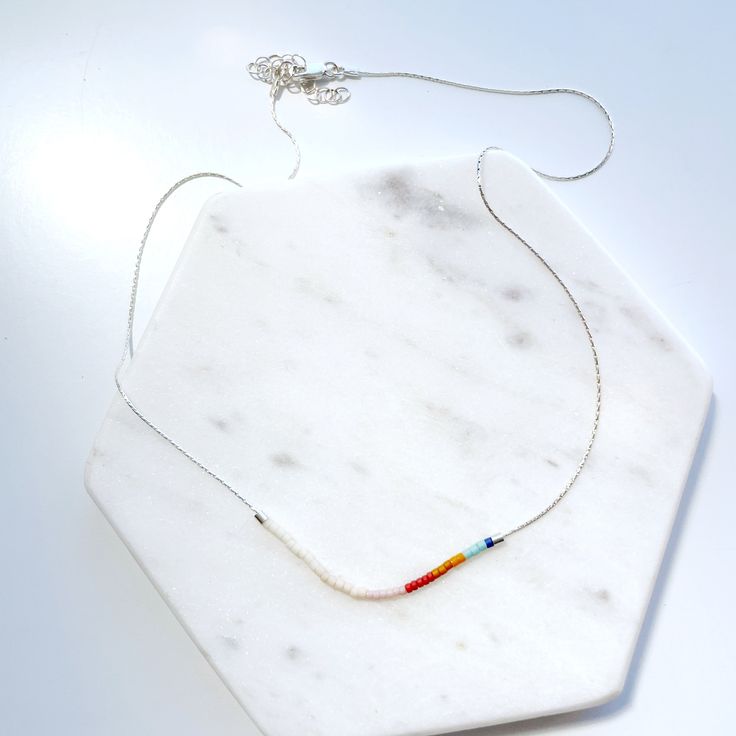 This is the new version of an old favorite, the Arco Iris Necklace. Arco Iris means rainbow in Spanish, and just like the original, this necklace is inspired by the rainbow fade of colors in the San Juan Island sunsets. Comes on 14K Gold filled or Sterling Silver Chains. Made with Japanese glass seed beads. Chains are 16” with 1”extender. ❤ Handmade with love on San Juan Island Iris Necklace, San Juan Island, Desert Sunset, Silver Chains, Glass Seed Beads, New Version, In Spanish, Jewelry Care, Sterling Silver Chains