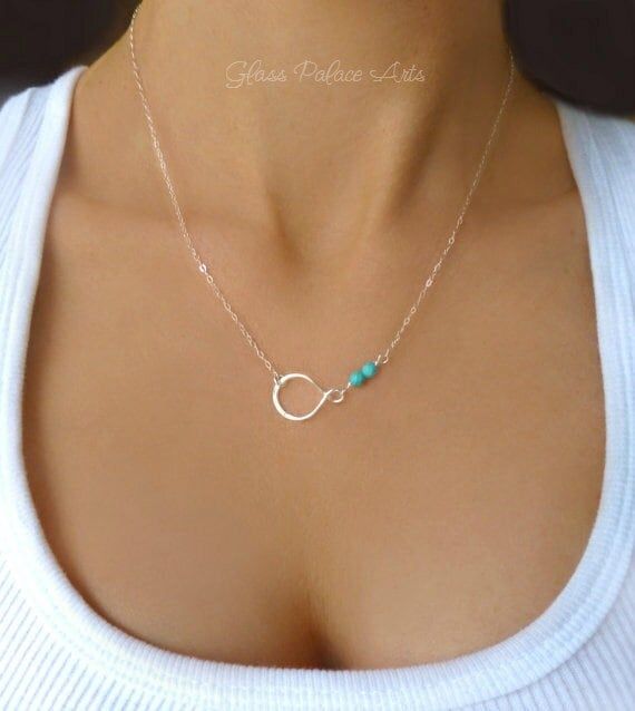 "* D E T A I L S * Small Beaded Silver Turquoise Necklace * Available in Gold or Sterling Silver A simple and dainty infinity necklace * So simple and modern! * 24k gold vermeil or sterling silver small infinity link * 20mm * Genuine dainty and genuine turquoise faceted beads * Chain is a shimmery 14k gold filled or sterling silver chain * Loop has a tiny stamp of authenticity of sterling or 24k gold metal on one side * Total necklace length shown at 18\" * Model has a size small neck * Necklace Bijoux Fil Aluminium, Modern Necklace, Turquoise Pendant Necklace, Real Turquoise, Infinity Necklace, Solitaire Necklaces, Necklace Simple, Bijoux Diy, Turquoise Pendant