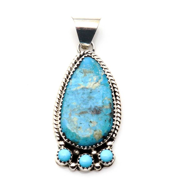 Be captivated by the beauty and craftsmanship of this turquoise pendant by Navaho artist Roy Yazzie (Hallmark RY). Adorned with a single stunning setting and 3 turquoise cabs at the bottom, this 1 3/4" long pendant (weighing 7.8 grams) is the perfect addition to any 6mm chain or necklace. Let this piece inspire your sense of style and showcase your appreciation for unique, handcrafted jewelry. Unique Handcrafted Jewelry, Long Pendant, Turquoise Pendant, Tear Drop, Handcrafted Jewelry, Hallmark, The Beauty, Sense, Turquoise