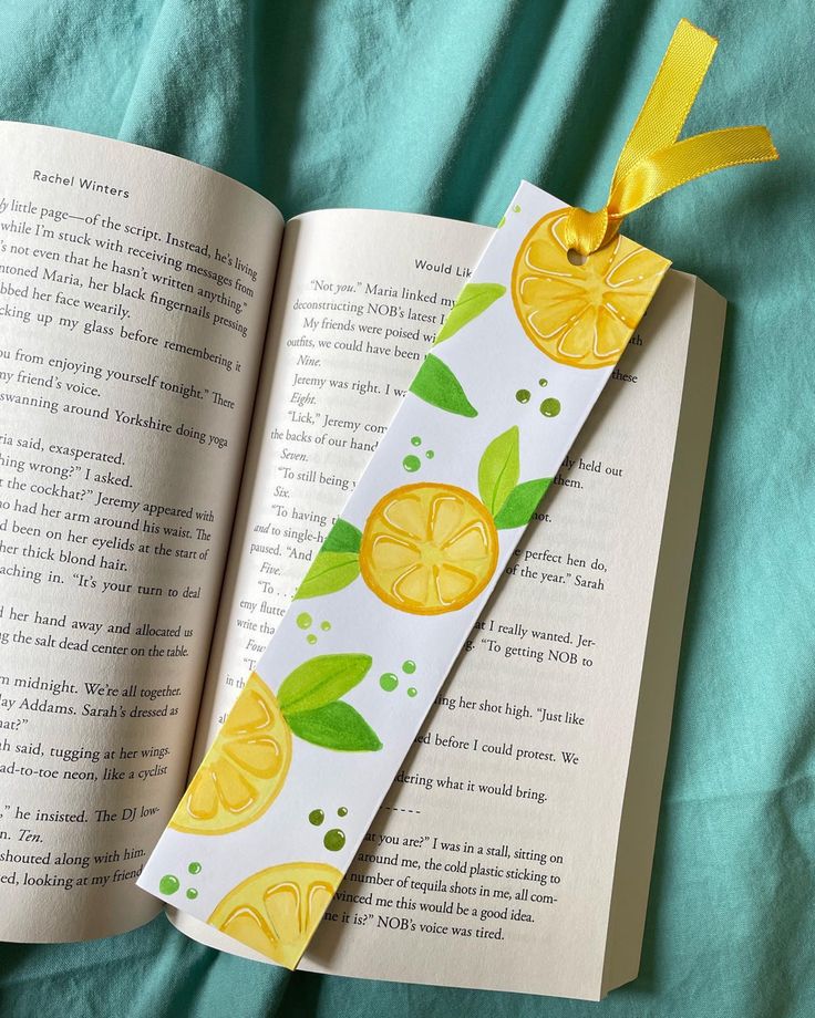 an open bookmark with lemons on it