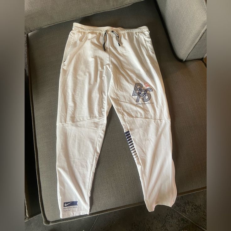 Nike Blue Ribbon Sports Track Pants Rare Nwt New With Tags Nike Truck Pant Joggers White. Size L Sports Track Pants, Nike Compression, Camo Jogger Pants, Sweatpants And Hoodie, Tapered Sweatpants, Sports Track, Athletic Sweatpants, Sports Sweatpants, Pants Nike