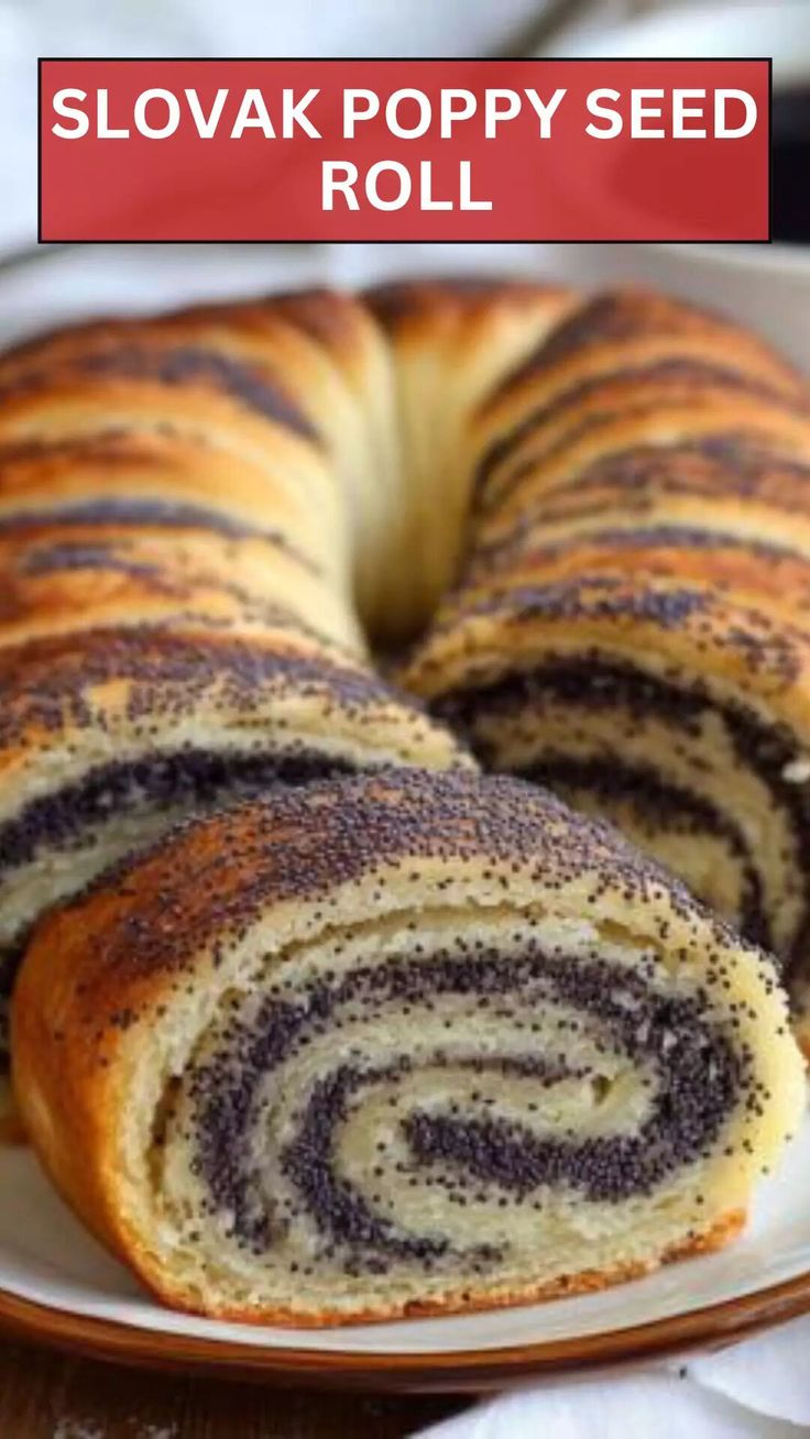 a close up of a cake on a plate with the words slovak poppy seed roll