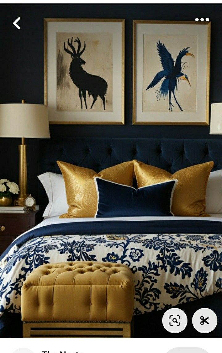 an image of a bedroom setting with blue and gold decor