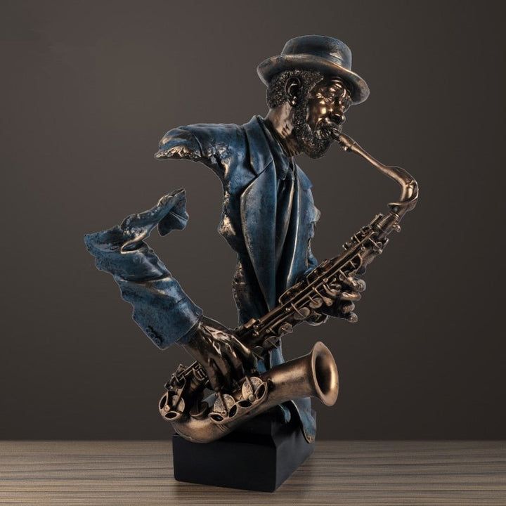 a statue of a man playing the saxophone