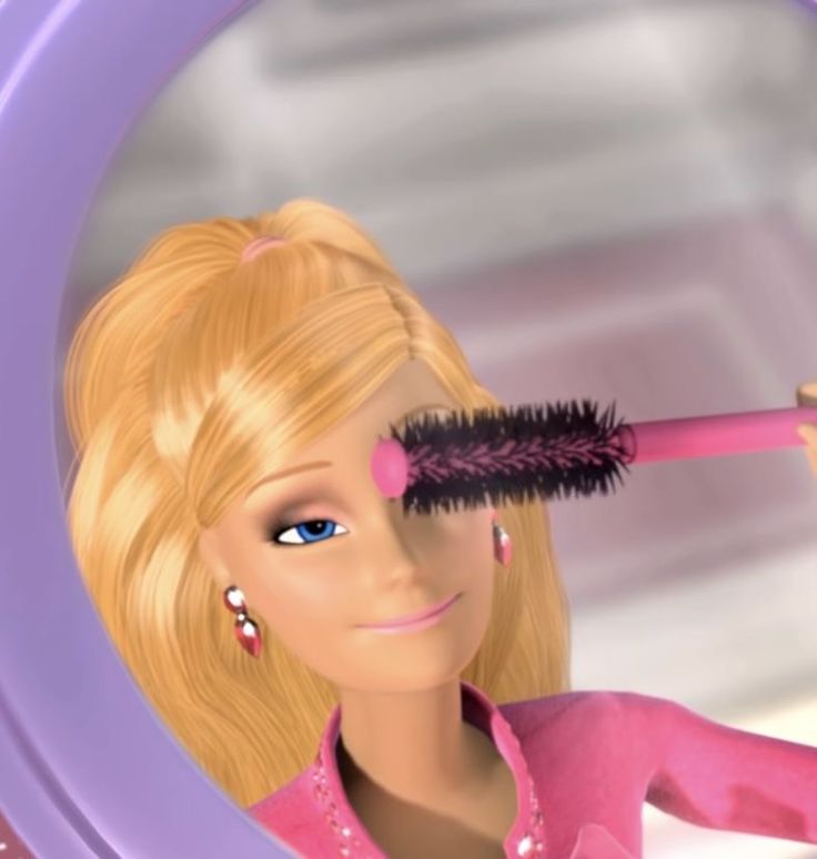 the barbie doll is brushing her hair with a brush