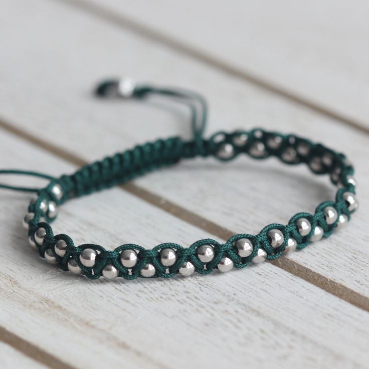 3 mm Rhodium Plated 925 Sterling Silver BeadsAdjustable Length (14 cm to 23 cm)Cord Color: Dark Green Modern Handmade Adjustable Sterling Silver Bracelet, Minimalist Green Beaded Bracelets With Tiny Beads, Minimalist Green Beaded Bracelet With Tiny Beads, Handmade Minimalist Green Beaded Bracelets, Minimalist Handmade Green Beaded Bracelets, Minimalist Handmade Green Friendship Bracelets, Handmade Green Braided Bracelets With Round Beads, Adjustable Green Beaded Bracelet Minimalist Style, Adjustable Green Beaded Bracelets Minimalist Style