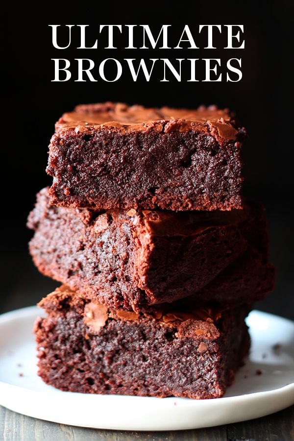 three chocolate brownies stacked on top of each other with the title overlaying