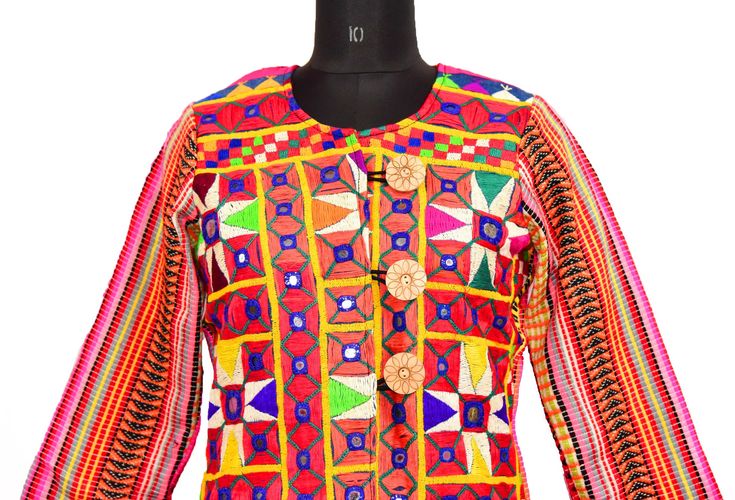 "Item Description Banjara Music Festival Look Whth Move Button Jacket Gujarat Embroidered Work Jacket, Tribal Coat Tribal banjara vintage back side fabric wool handmade fabric created by the ancient nomadic tribes of india; upcycled into a beautiful mirror embellished long coat. Measurements: Jacket Size Type: Regular Jacket Size (Women's): M Decade: 1990s Whth Move Button Jacket Bust/Chest Size - \"40\" Inches Jacket Length - \"30\" Inches Jacket Shoulder to Shoulder: Size - \"16\" Inches Jacke Bohemian Cotton Outerwear With Button Closure, Traditional Long Sleeve Outerwear With Button Closure, Traditional Outerwear With Button Closure For Fall, Folk Style Multicolor Outerwear For Festivals, Traditional Long Sleeve Nehru Jacket With Buttons, Traditional Spring Outerwear With Buttons, Fitted Multicolor Nehru Jacket With Long Sleeves, Festive Multicolor Long Sleeve Outerwear, Fitted Multicolor Long Sleeve Nehru Jacket