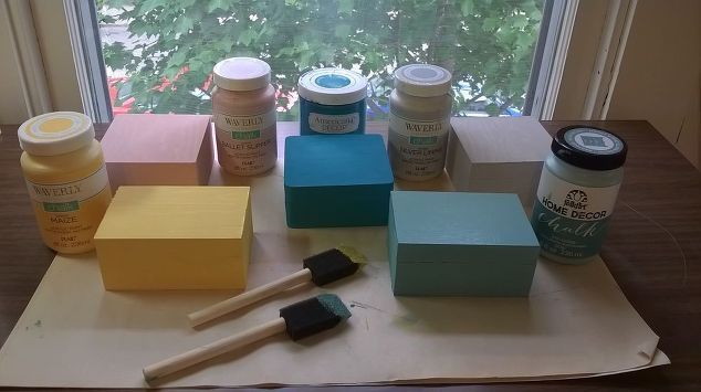 the supplies needed for painting in front of a window