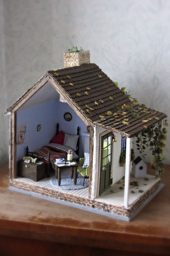 a doll house is shown on a table