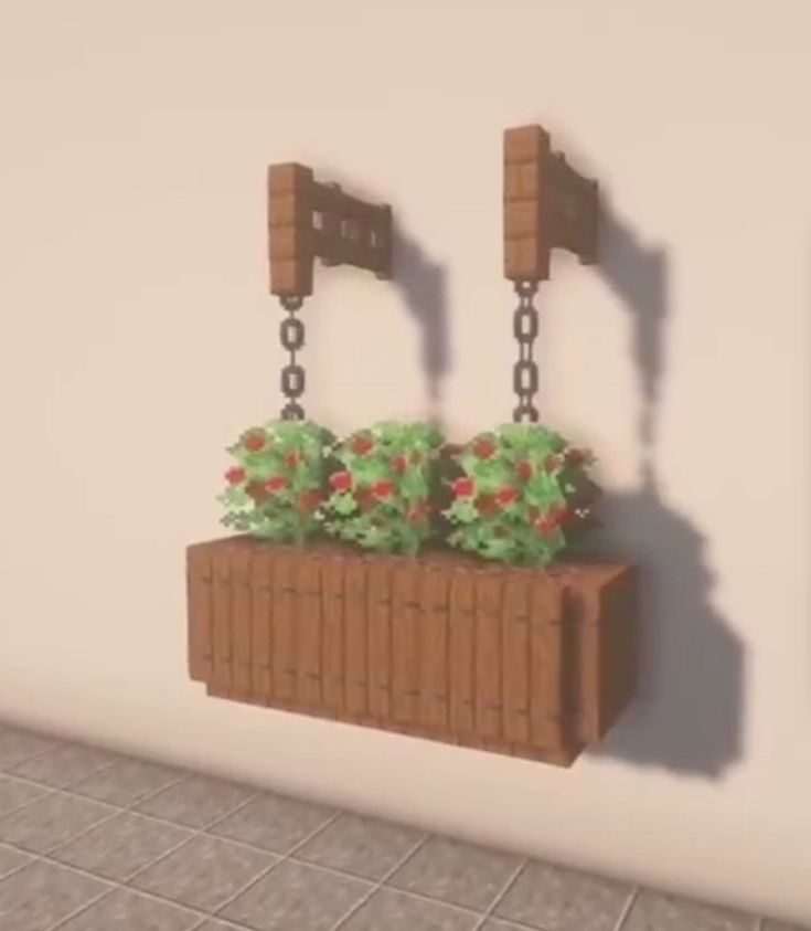 a wall mounted planter with flowers in it