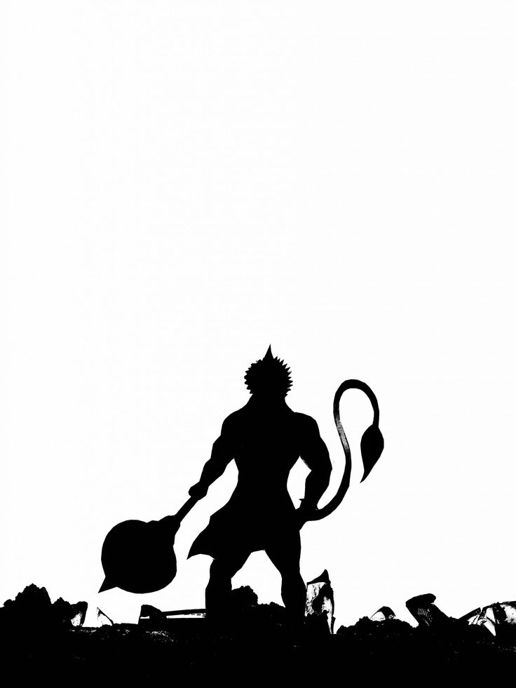 the silhouette of a man holding a paddle and wearing a horned head, standing on top of a hill