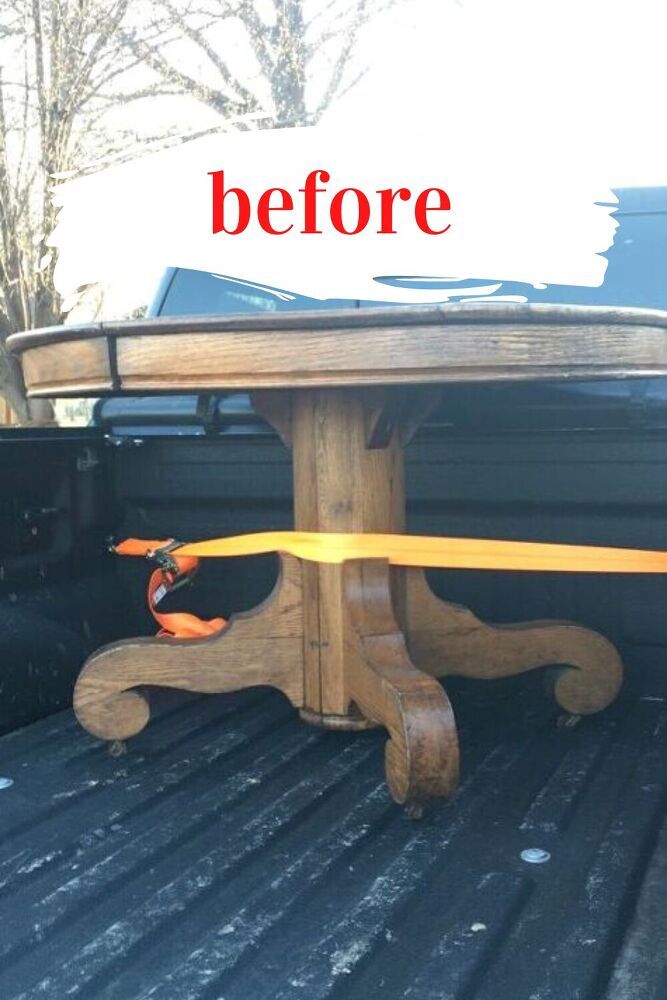 a table that has been placed in the back of a truck with tape on it