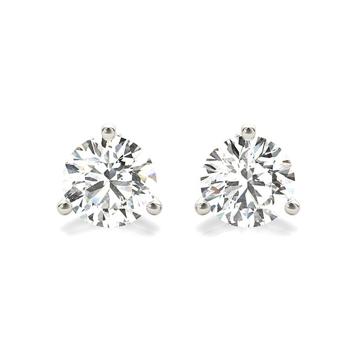 Enhance your jewelry collection with our Three Prong Diamond Stud Earrings! These stunning earrings feature lab grown diamonds for a sustainable and affordable option. The classic round stones add timeless elegance to any outfit. Elevate your style and make a statement with these exquisite earrings. IGI certificates are provided for earrings with a total carat weight of 2.00 and above Timeless Diamond White Round Bridal Earrings, Timeless Diamond White Bridal Earrings, Classic Diamond Drop Earrings For Everyday Luxury, Lab Grown Diamond Round Earrings, Solitaire Diamond Round Earrings, Classic Solitaire Cubic Zirconia Earrings, Classic Diamond Solitaire Earrings, Elegant Round Lab Grown Diamond Earrings, Classic Bridal Earrings With Prong Setting