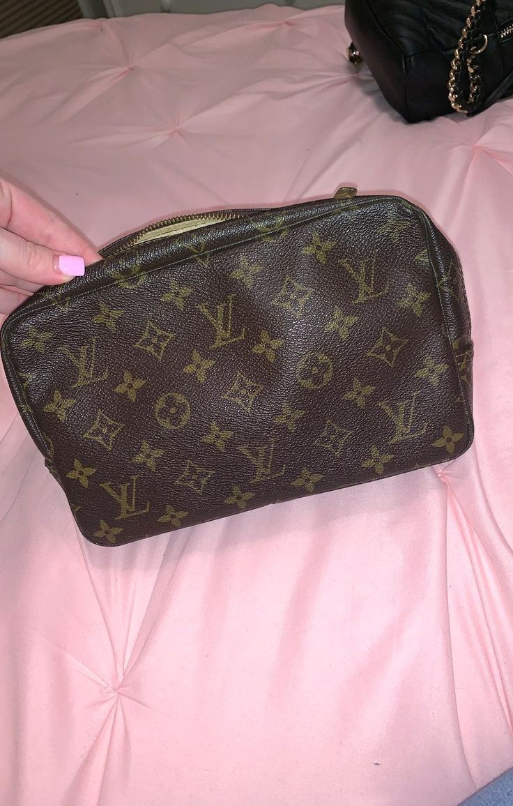 Authentic Louis Vuitton toilette 23 with brass hardware does have a few stains the zipper does not work properly and does not zip all the way around like it should but can be fixed does not come with dust bag or box can be used as a cosmetic travel bag date code is hard to read 833 please ask questions if you have any before purchasing price firm Louis Vuitton Cosmetic Bag, Travel Cosmetic Bags, Cosmetic Bags, Brass Hardware, Authentic Louis Vuitton, Travel Bag, Cosmetic Bag, To Read, The Way