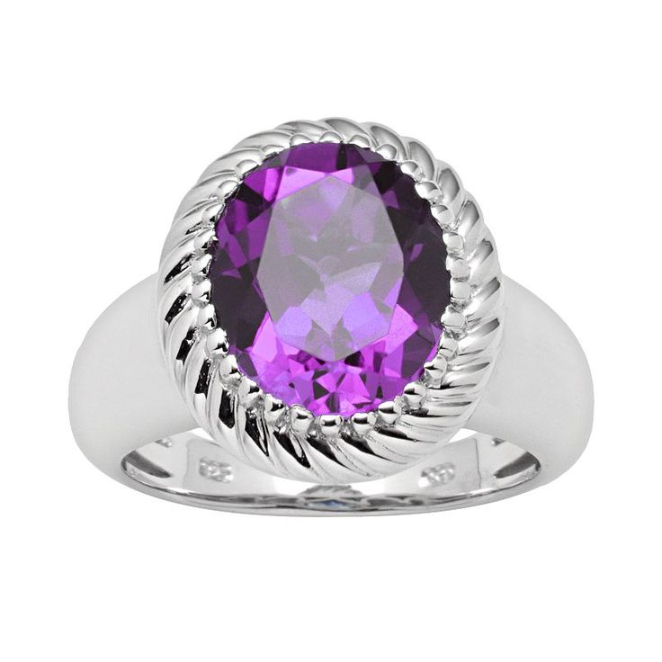 Rhodium plating provides a lasting shine. Details:  5/8-in. width Rhodium-plated sterling silver  Size: 7. Color: Purple. Gender: female. Age Group: adult. Silver Oval Amethyst Ring With Gemstone Accents, Oval Silver Amethyst Ring With Gemstone Accents, Elegant Sterling Silver Amethyst Ring Oval Cabochon, Oval Amethyst Ring With Gemstone Accents In Sterling Silver, Oval Amethyst Ring With Center Stone, Oval Purple Gemstones, Oval Amethyst Sterling Silver Ring For Formal Occasions, Polished Amethyst Ring For Anniversary, Polished Amethyst Anniversary Ring