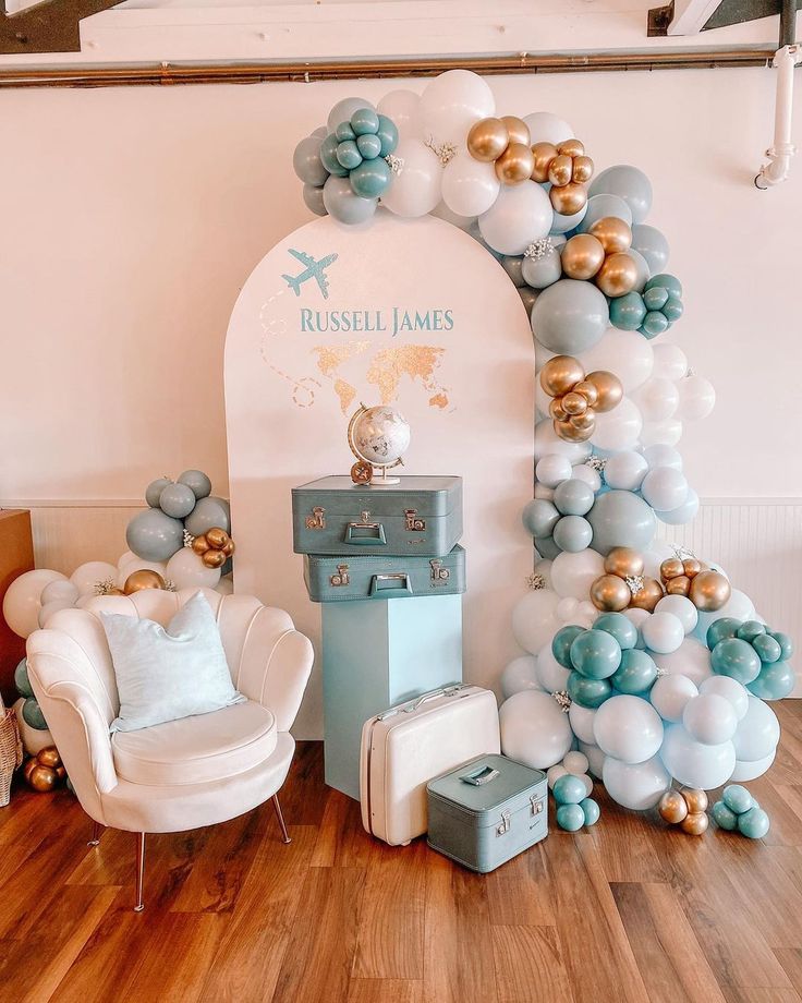 a room filled with balloons and furniture