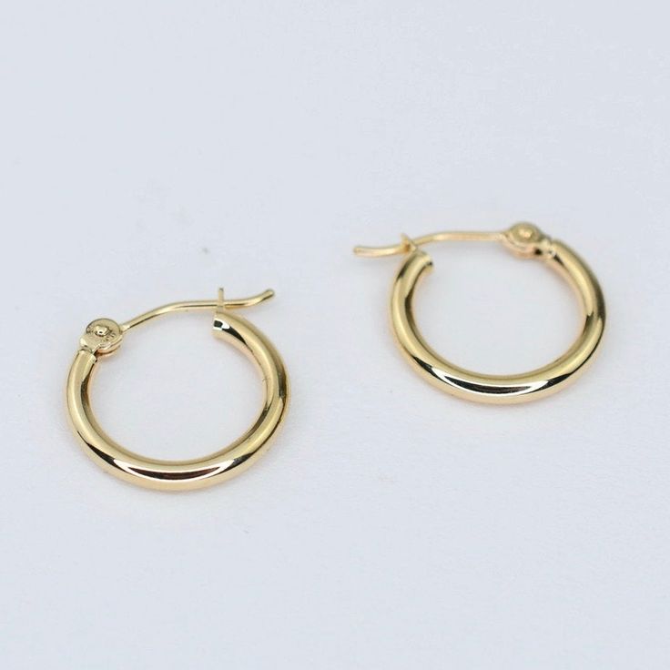 14K gold hoop earrings. 14K yellow gold hoop earrings. The earrings will arrive in a gift box ready for someone special! Dimensions : 15mm diameter To see add-on click on the link below. https://www.etsy.com/shop/SashJewelry?section_id=12359884 To see more children's jewelry click on the link below. http://www.etsy.com/shop/SashJewelry?section_id=12441132 To see more Sash Jewelry items click on the link below. http://www.etsy.com/shop/SashJewelry Please don't hesitate to contact me for custom or 14k Gold Filled Round Hoop Earrings For Formal Occasions, Formal 14k Gold Filled Round Hoop Earrings, 14k Yellow Gold Hoop Earrings With Ear Wire, Dainty 14k Yellow Gold Hoop Earrings, Gold 14k Small Hoop Huggie Earrings, Yellow Gold Hoop Earrings With Lever Back For Gift, Gold Small Hoop Huggie Earrings Stamped 14k, Small Hoop Huggie Earrings Stamped 14k For Gift, Gold 14k Stamped Small Hoop Huggie Earrings