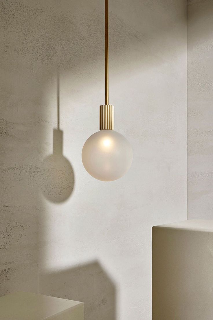 a light that is hanging from the side of a wall