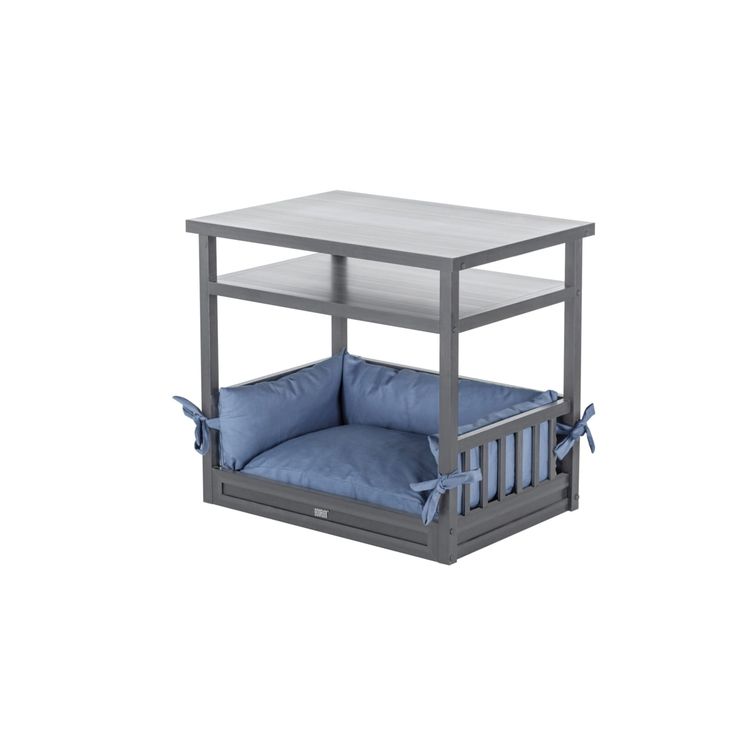 a black and blue bunk bed with pillows on it's bottom shelf, in front of a white background