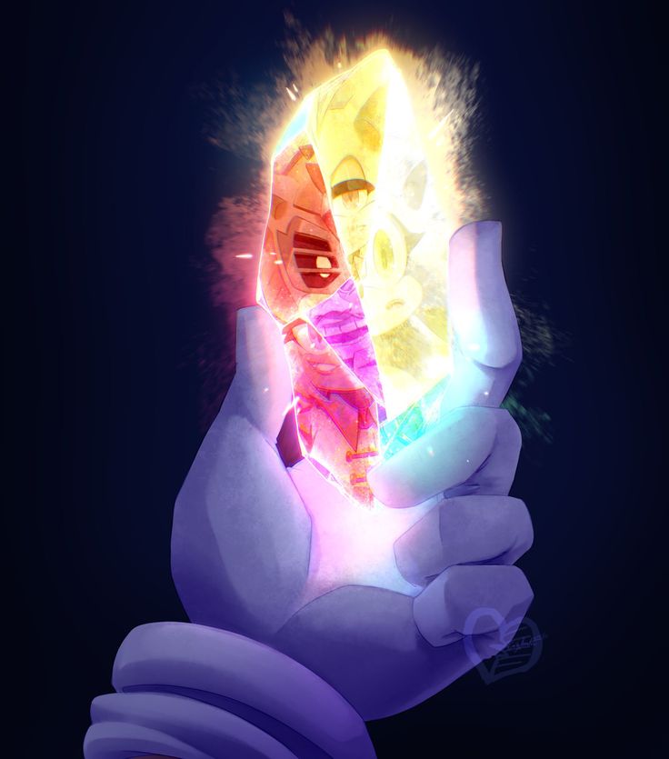 a person holding a glowing object in their hand with the light coming out from it