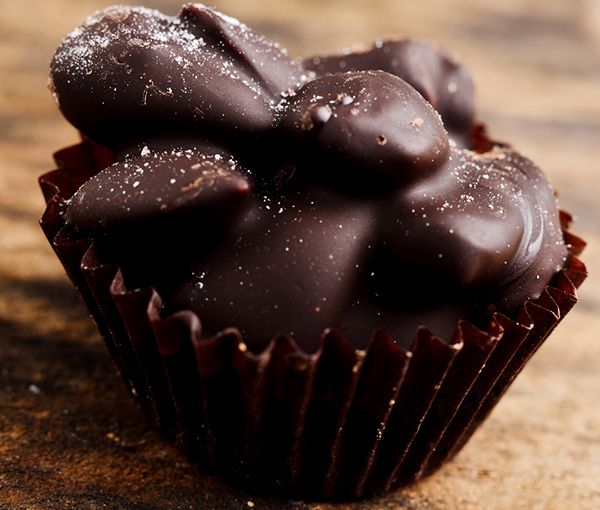 a close up of a chocolate cupcake on a table