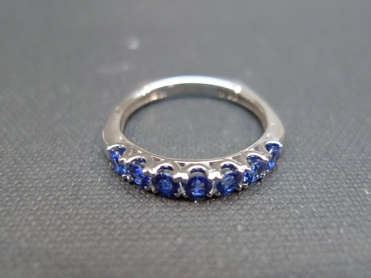 A blue sapphire ring with European Shank as an engagement ring, wedding band, anniversary gift, or a personalized jewelry. Product Specifications: Type: Natural Round Brilliant Cut Blue sapphires Number of Gemstones: 7 (3mm each) Precious Metal: 14K White Gold Ring width: 3.0mm European shank Currently made to order pieces may take up to 10 business days to complete, or let me know if you need it urgent. You may also like: A similar ring with blue sapphire, https://www.etsy.com/listing/99444843/ Blue Sapphire Wedding Band, Sapphire Wedding Rings, Sapphire Wedding Band, Sapphire Band, Blue Sapphire Ring, Sapphire Wedding, Blue Sapphire Rings, 14k White Gold Ring, Yellow Sapphire