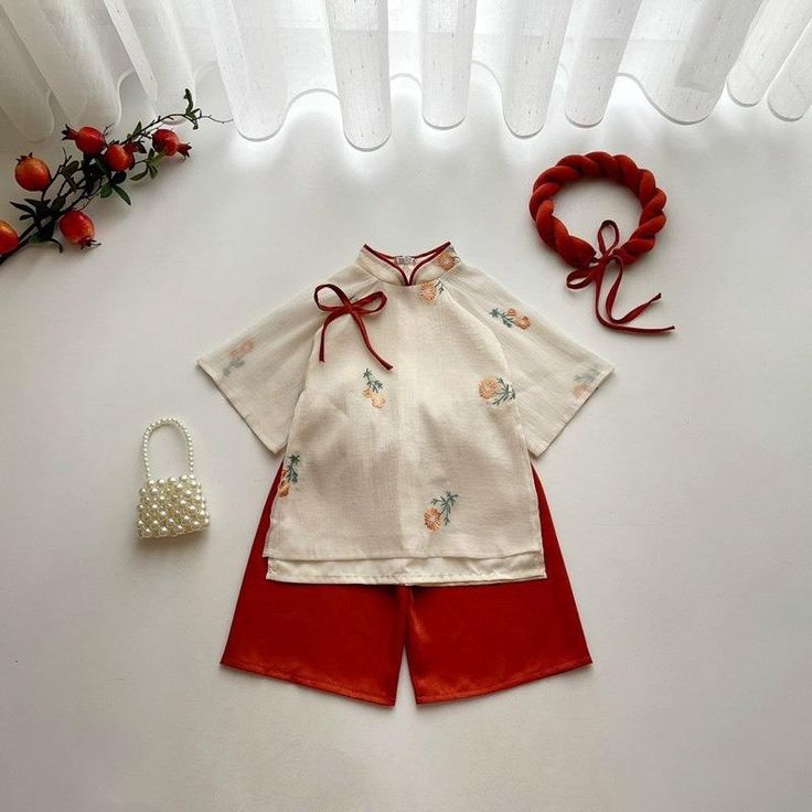 PRODUCT INFORMATION ● Product name: KIDS Embroidered Cream Flower Ao Dai with Ruffled Hedgehog for Girls 6 months, 1 year old to 8 years old AD136 ● Material: embroidered cotton fabric ● Size: 4-28kg ● Color: cream + orange pants Cute Embroidered Cotton Sets, Embroidered Short Sleeve Sets For Spring, Traditional White Short Sleeve Sets, Embroidered Short Sleeve Spring Sets, Embroidered Short Sleeve Summer Sets, Cute White Floral Embroidered Sets, Cute White Sets With Floral Embroidery, Spring Embroidered Short Sleeve Sets, Cute White Floral Embroidery Sets